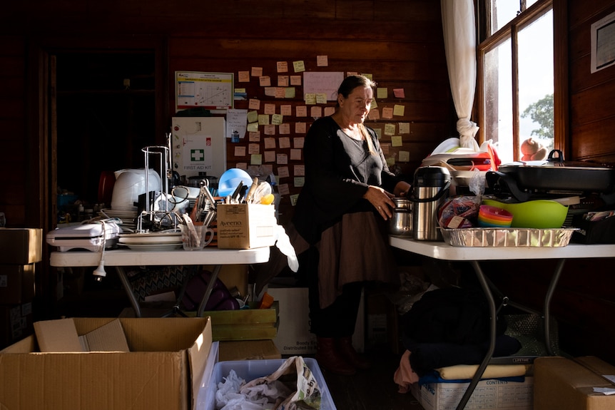 Quaama relief centre coordinator Veronica Abbott sorts through bulk donations.