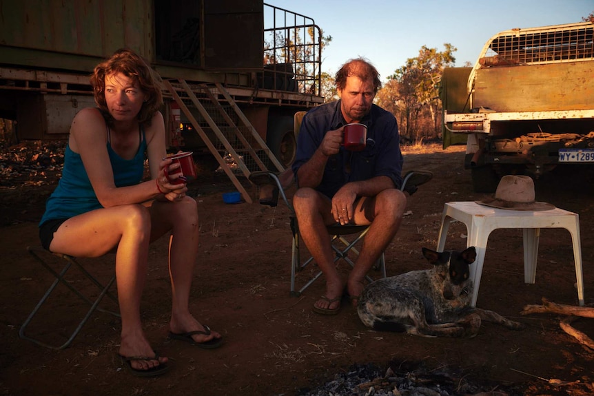 The couple share a cuppa shortly before getting to work.