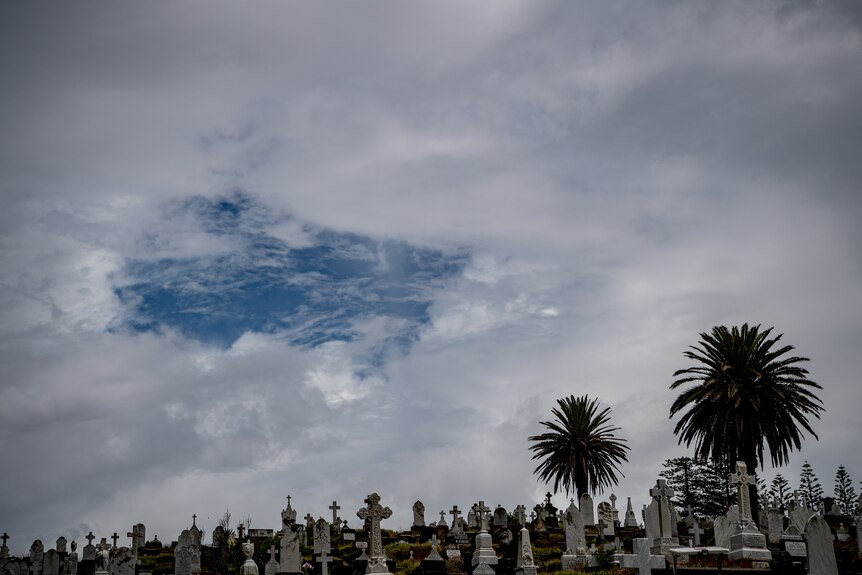 A cemetary with blue sky