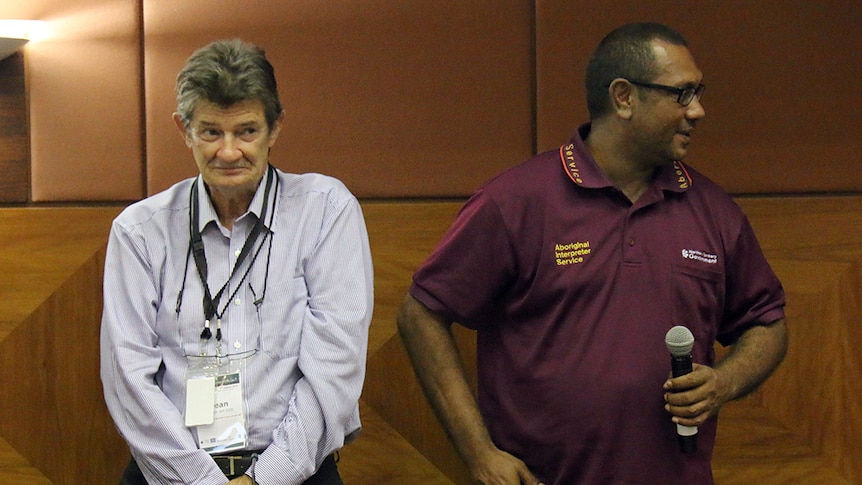 Justice Dean Mildren (left) appears in the Supreme Court dock in a role playing exercise in Darwin