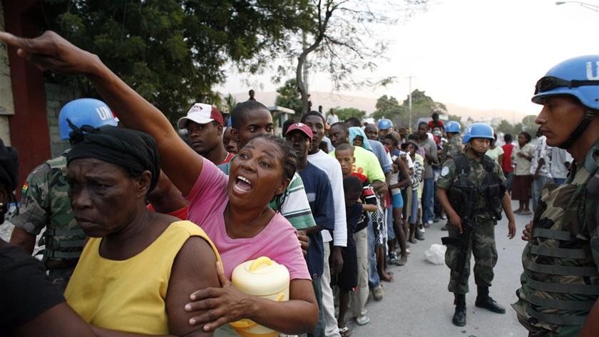 Haitians line up for food aid