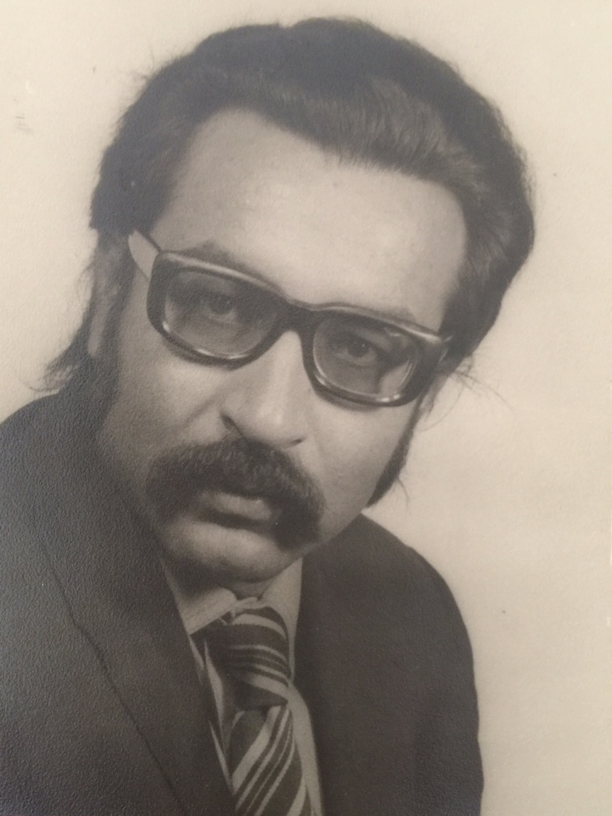 An old, black and white portrait of Doctor Mirza Datoo