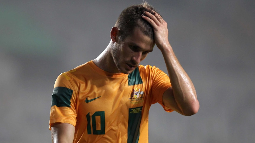 Dario Vidosic looks dejected for Socceroos