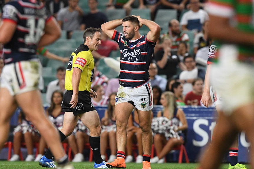 Sydney Roosters fullback James Tedesco holds his hands to his head