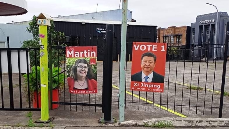 A legitimate campaign poster next to a fake poster showing the face of China's Communist party leader and President.