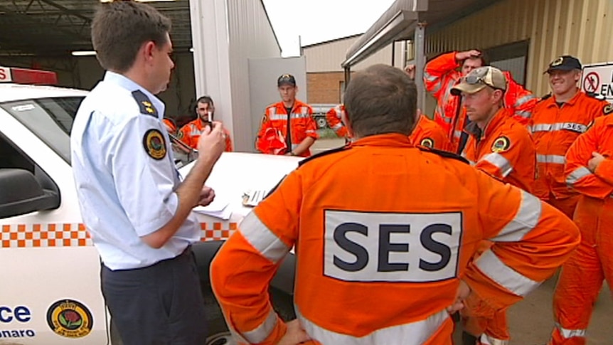 Video still: SES personnel gathered together