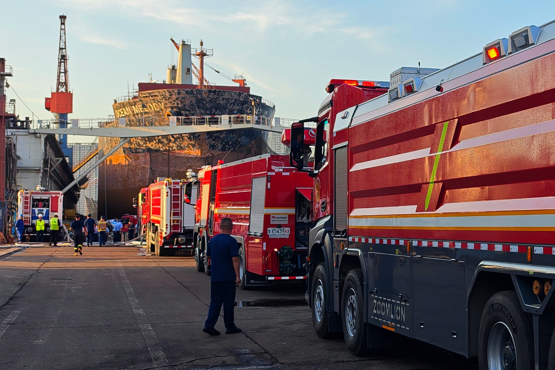 At least 25 people killed in cargo ship blaze in Chinese port