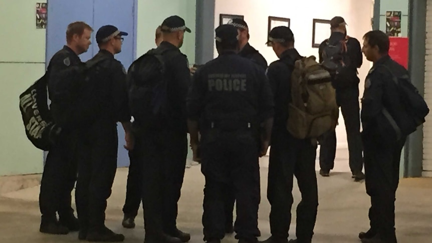 AFP officers arrive on Christmas Island after a disturbance at the detention centre on November 9, 2015.