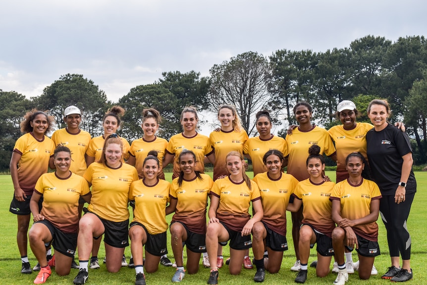 The First Nations Sevens women's squad gather for a photo.