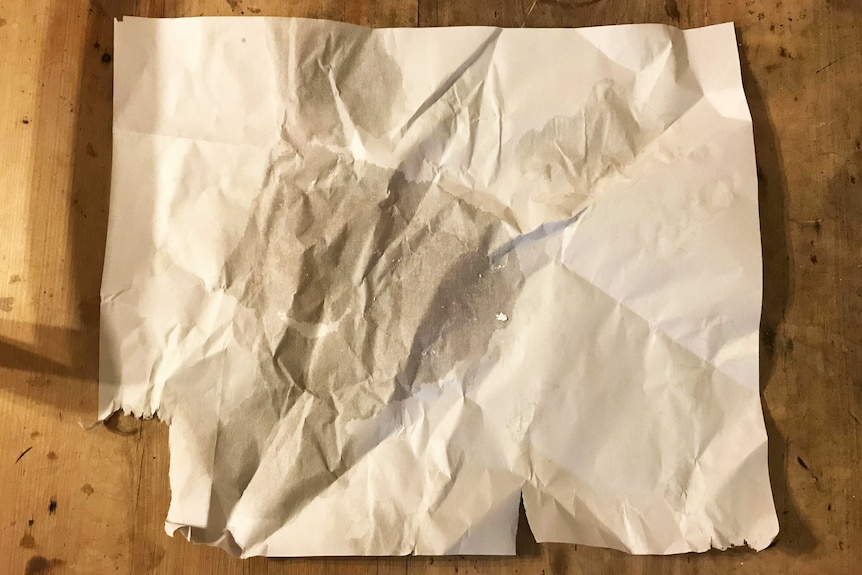 Paper from the supermarket deli used to wrap up feta cheese representing our reporter's attempt to go one week without plastic.