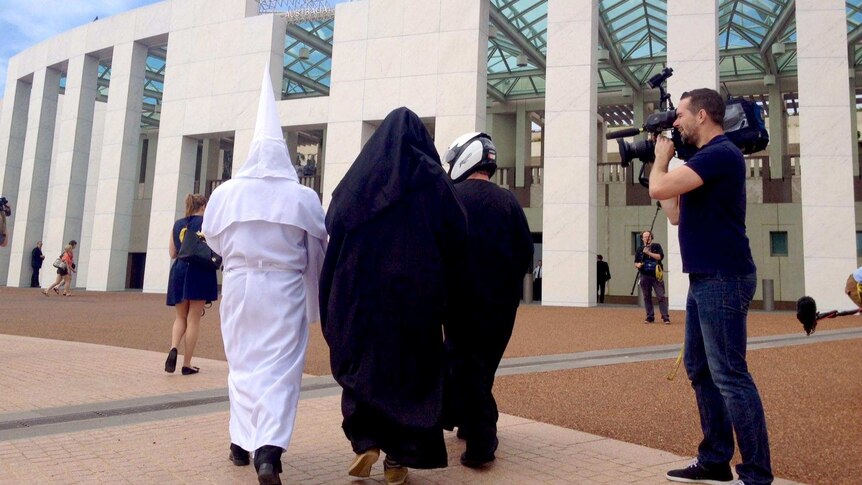 Men Wearing Kkk Outfit Niqab And Motorbike Helmet Try To Enter Parliament Abc News