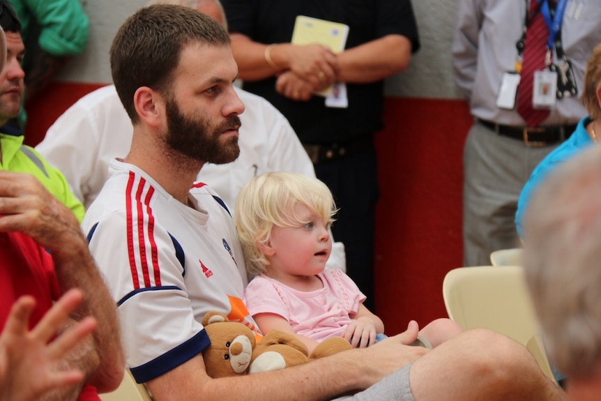 The community bushfire meeting was attended by residents including Pete Shurmer with daughter Mikaylah