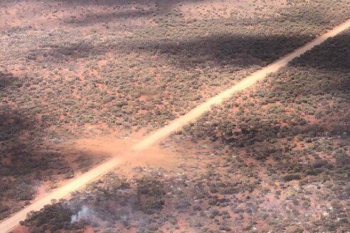 a crater on a outback road from the air 