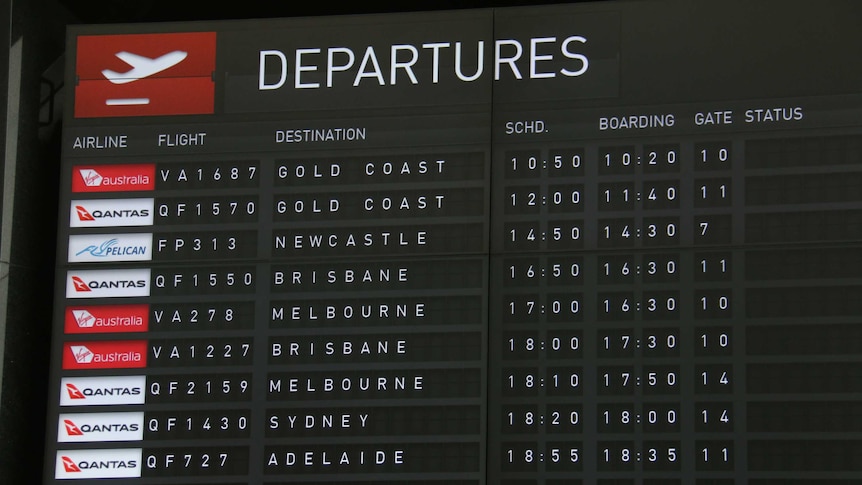 An airport screen shows flights to Queensland.