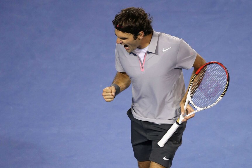Federer steams back into semi