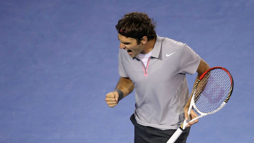 Federer steams back into semi