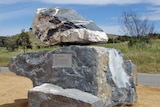 The rock from Bendigo (top) has been stolen from the National Rock Garden.