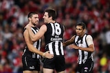 Chris Dawes (L) said Collingwood's talent for holding the ball in its attacking 50m with its highly-effective forward press would be a key against Geelong.