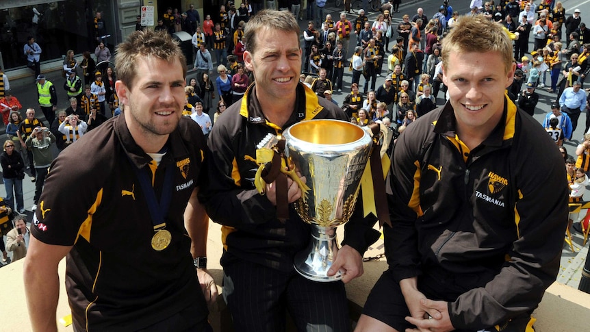 Hawthorn's Luke Hodge, Alastair Clarkson and Sam Mitchell with the AFL premiership cup