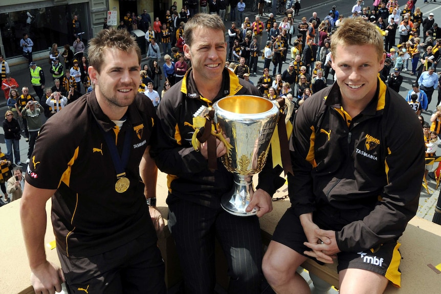 Hawthorn's Luke Hodge, Alastair Clarkson and Sam Mitchell with the AFL premiership cup