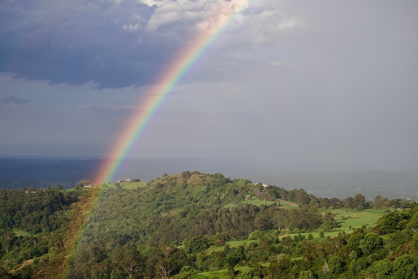 Storm clouds and a rainbow near Maleny in the Sunshine Coast hinterland.
