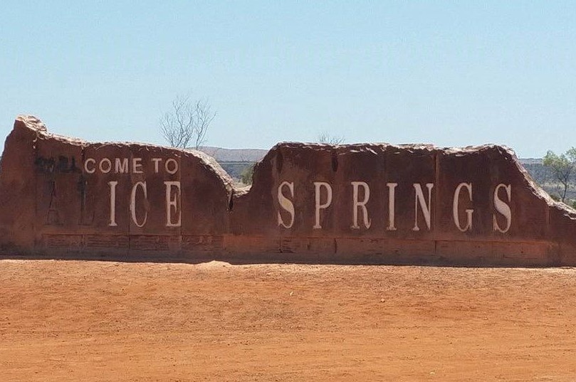 Vandalised 'Welcome to Alice Springs' sign