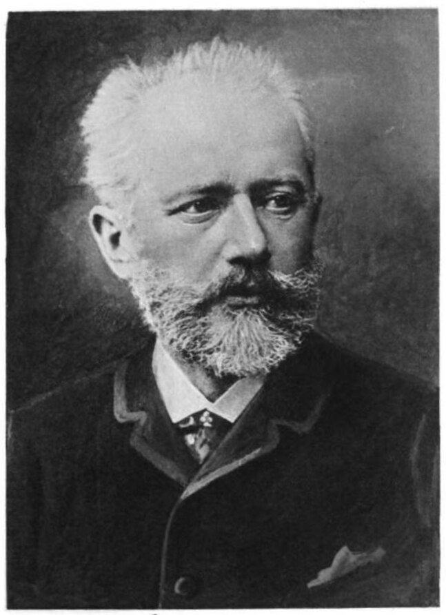 A black and white photo of a stern faced Pyotr Ilyich Tchaikovsky