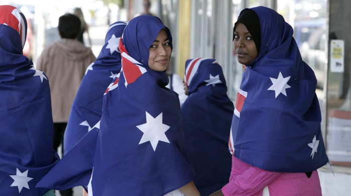 Young Muslim women modelling Australian flag hijabs.