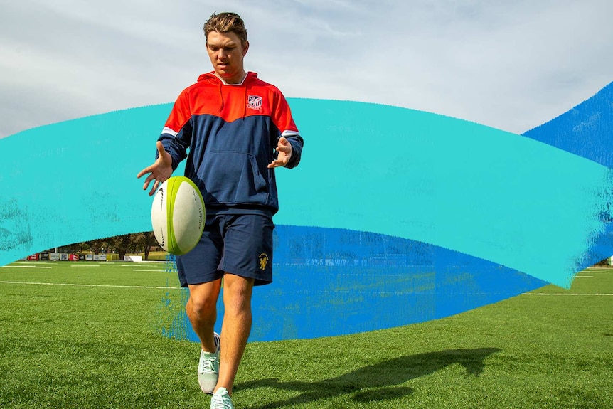 Man in rugby training gear kicks a rugby ball
