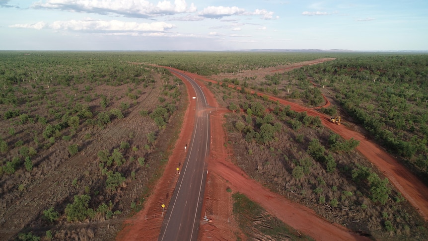 Aerial of sealed outback road 