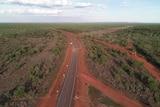Aerial of sealed outback road 