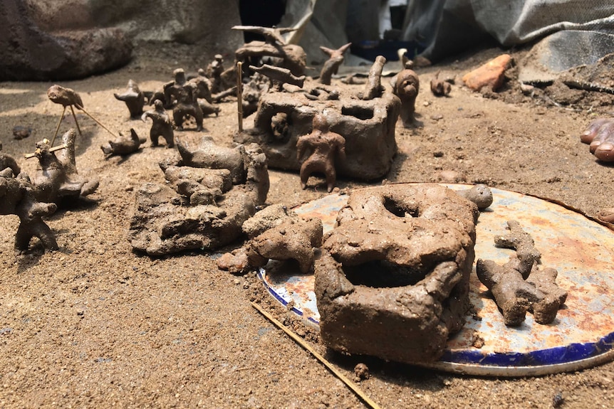 Soldiers, tanks and helicopters made out of clay.