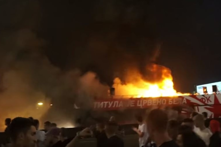 The Red Star Belgrade soccer team's bus set on fire during a parade to celebrate their league victory