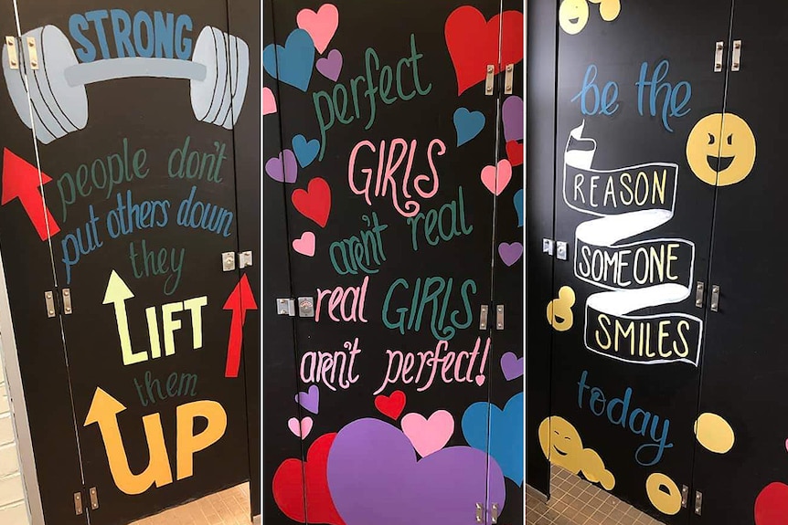 Colourful, positive messages painted on black toilet doors at a school in Sydney.