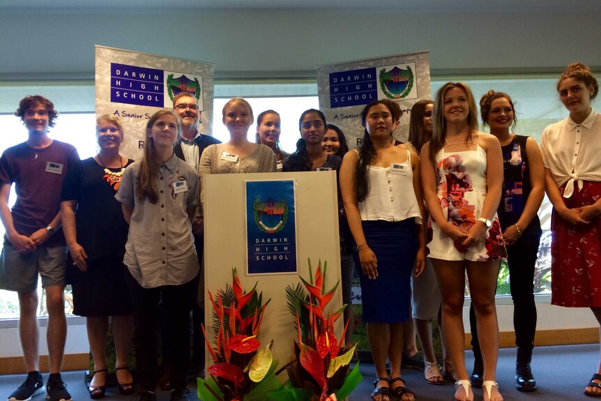 Year 12 graduating students from Darwin High School with Peter Chandler and Natasha Griggs.