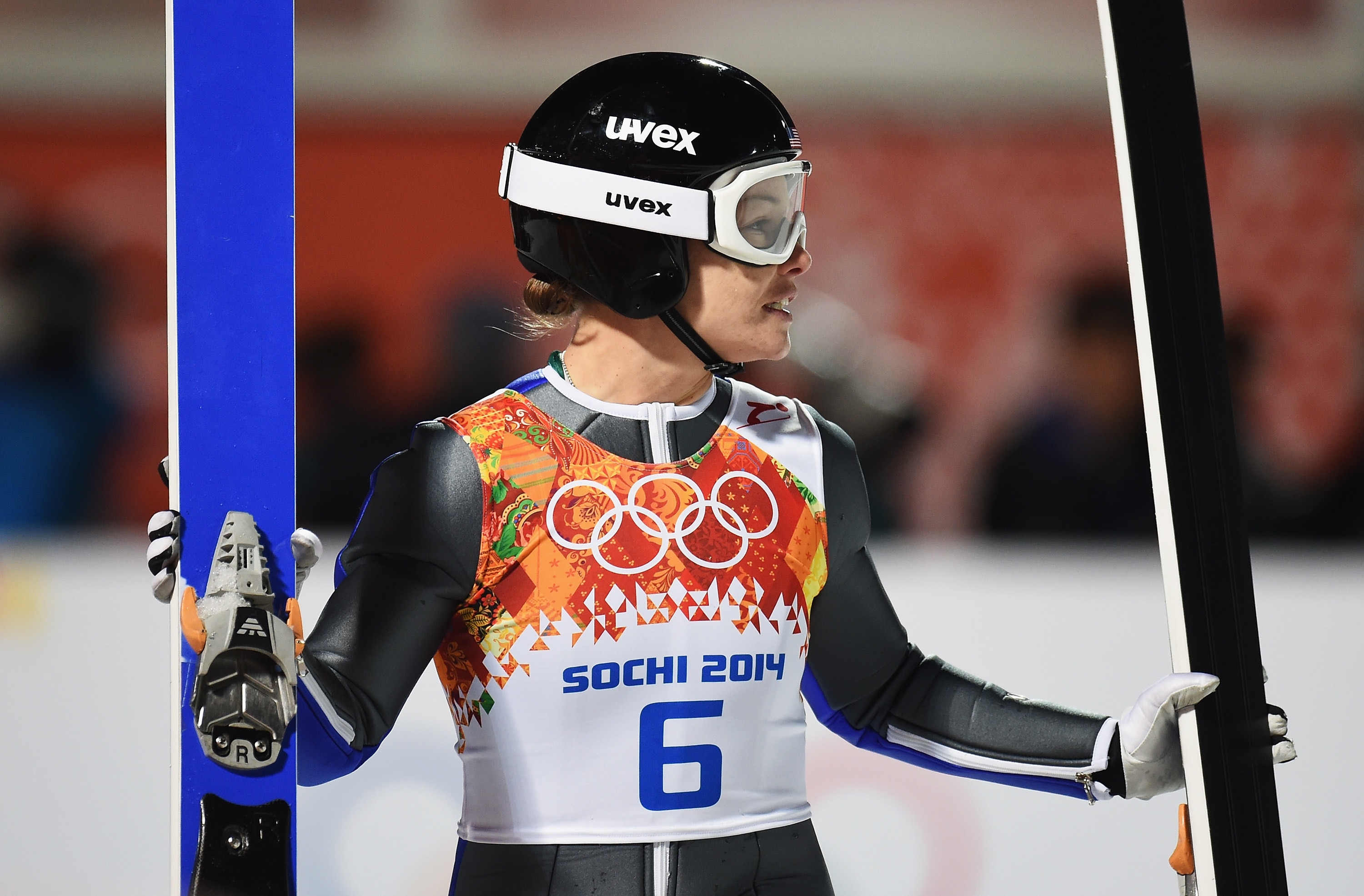 Lindsey Van holds her skis