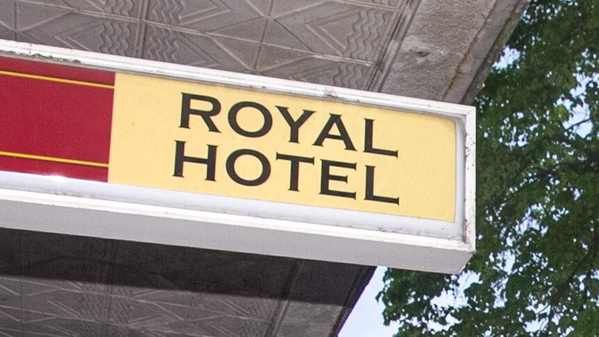 Close up of a pub sign saying Royal Hotel