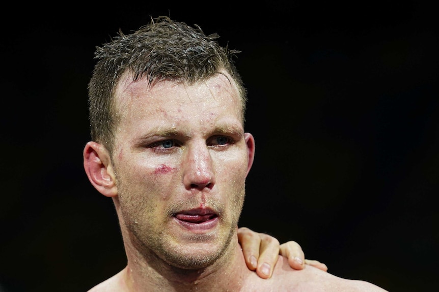 Jeff Horn reacts after losing against Tim Tszyu.