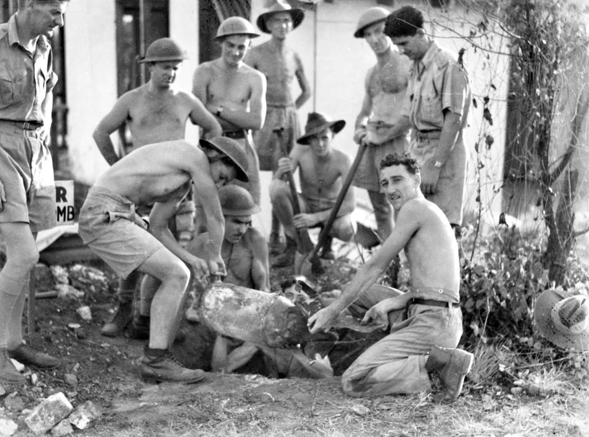Bomb disposal experts recovering an unexploded Japanese aerial bomb in Darwin