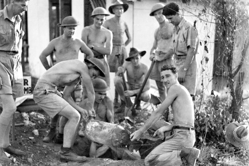 Bomb disposal experts recovering an unexploded Japanese aerial bomb in Darwin