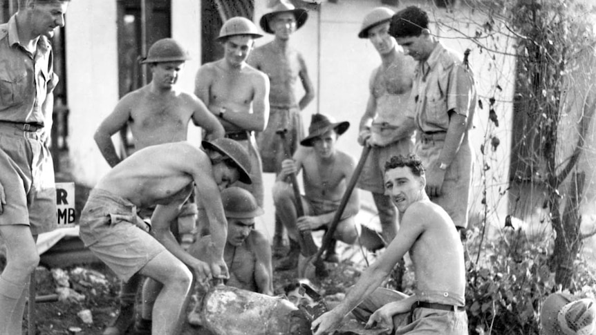 Bomb disposal experts recovering an unexploded Japanese aerial bomb in Darwin