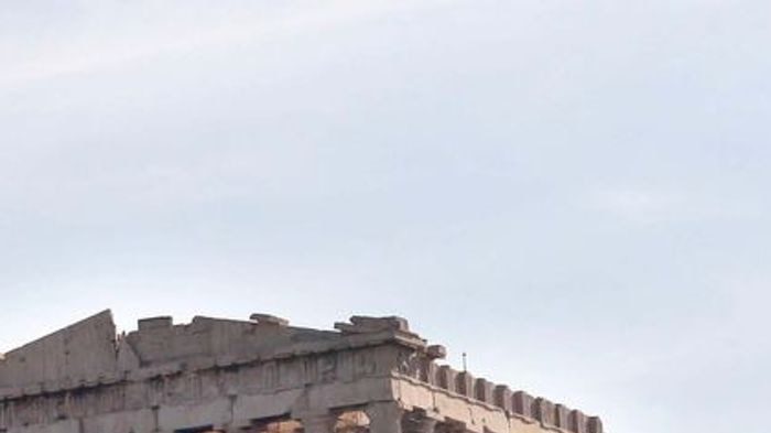 Giant banners protesting Greece's austerity measures hang near the Parthenon on Acropolis hill