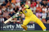 Aaron Finch smashes the ball en route to scoring 156 from 63 balls.