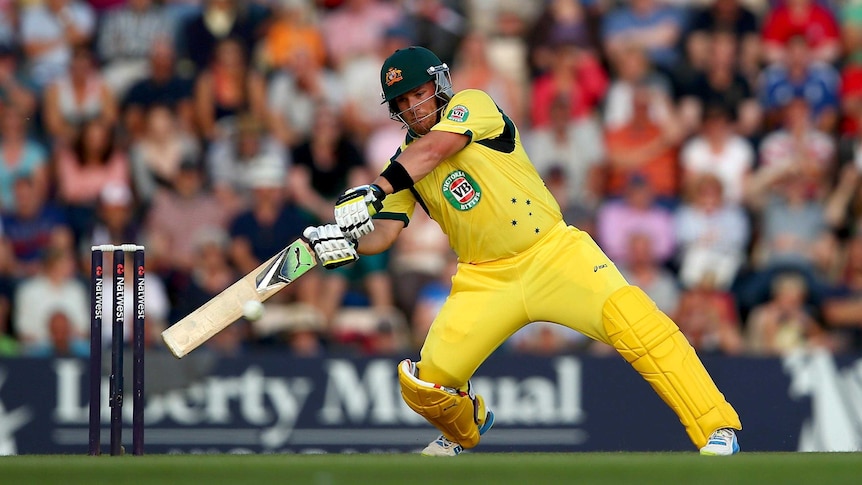 Aaron Finch smashes the ball off on knee