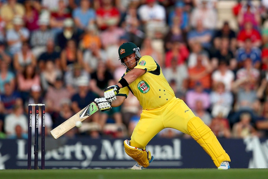 Aaron Finch smashes the ball off on knee