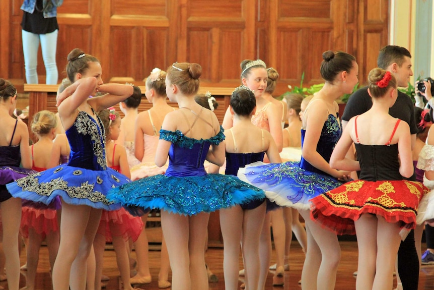 Ballet dancers in blue tutus