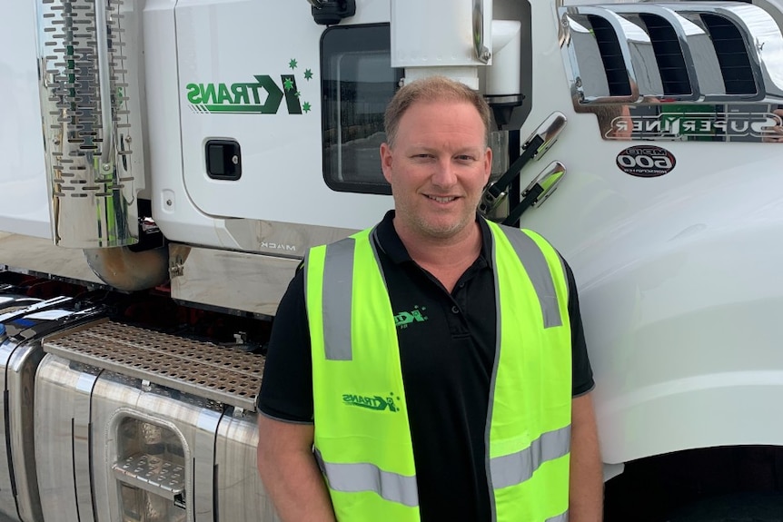 Wade Jolly standing near a truck.