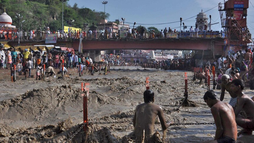 Hindu devotee in flooded Ganges