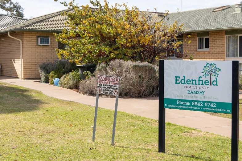 A photo of a blonde brick building with a sign reading Edenfield Family Care on lawn out the front.