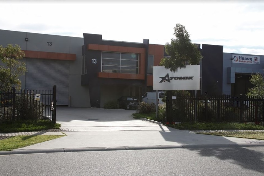 A picture of the Dandenong South warehouse with Atomik sign out front